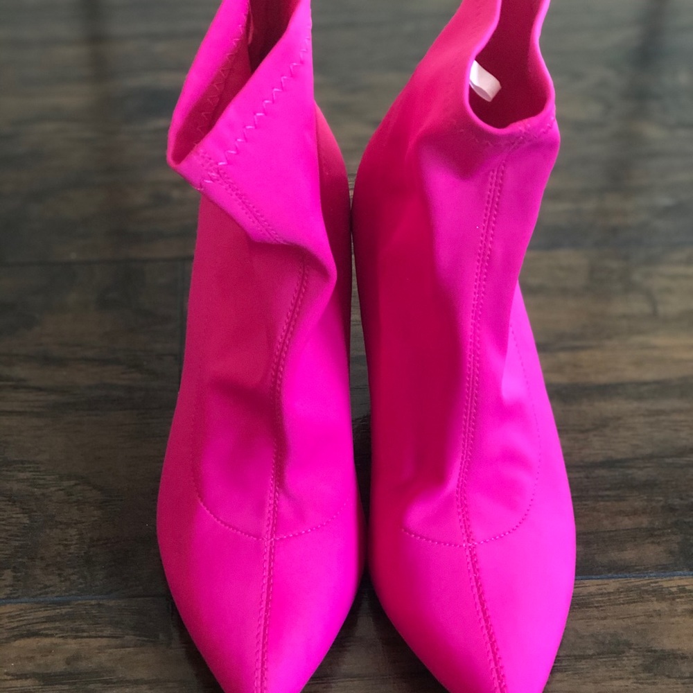 Bright Pink Heeled Boots.